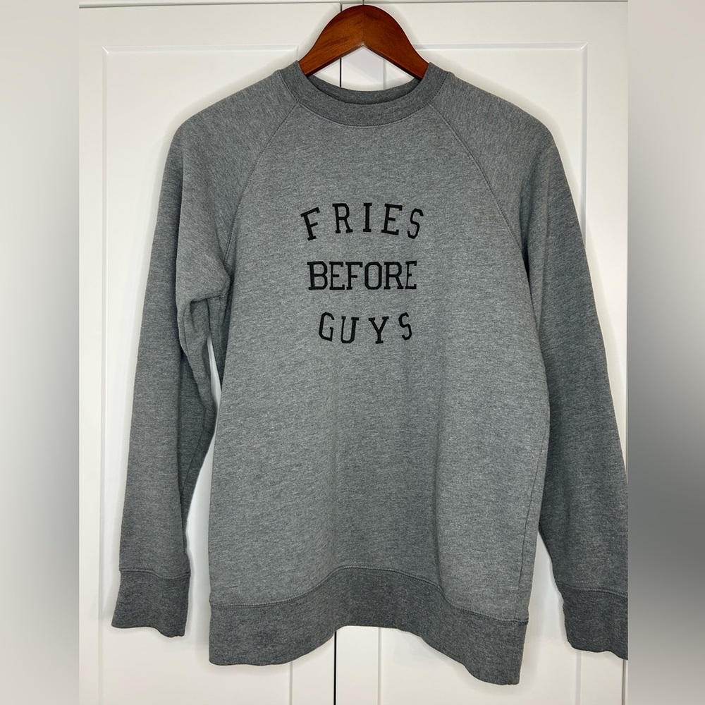 Fries before guy’s sweatshirt